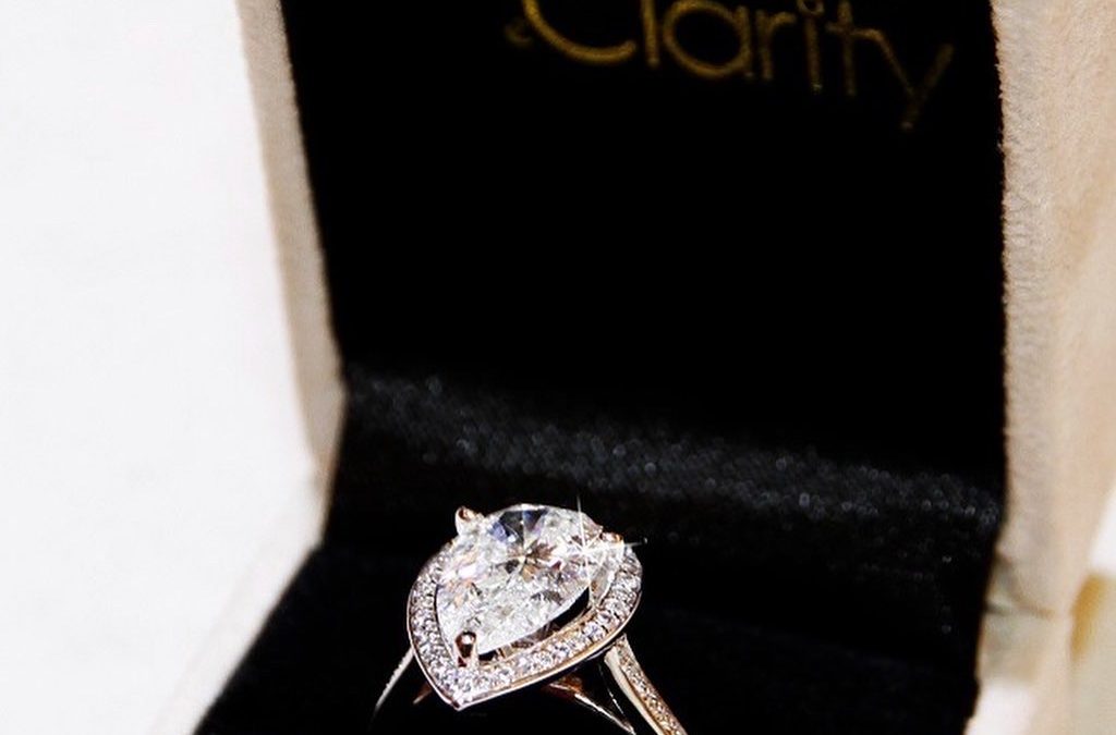 Fancy Pear-Shaped Diamond Ring with Pave Diamonds in 18k White Gold